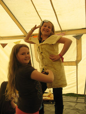 Making wearable fashion items in the Art Tent!